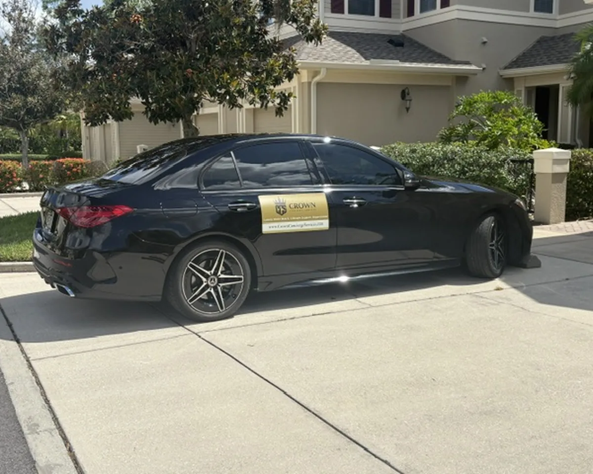 Crown Concierge Services vehicle arriving at a client's home